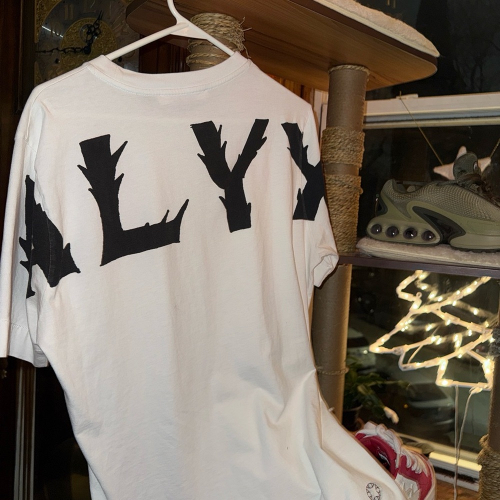 1017АLYX 9SM White T-Shirt with Black Graphic